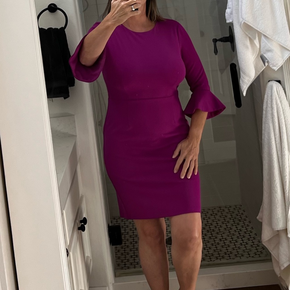 Size 12 Donna Morgan, Worn once, it’s very comfortable w a tiny bit of stretch.